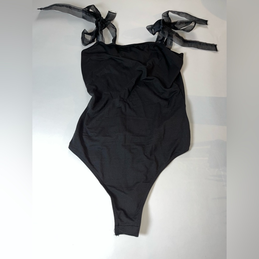 Black American threads bodysuit. Fabulous adjustable ties at shoulder.  Size med